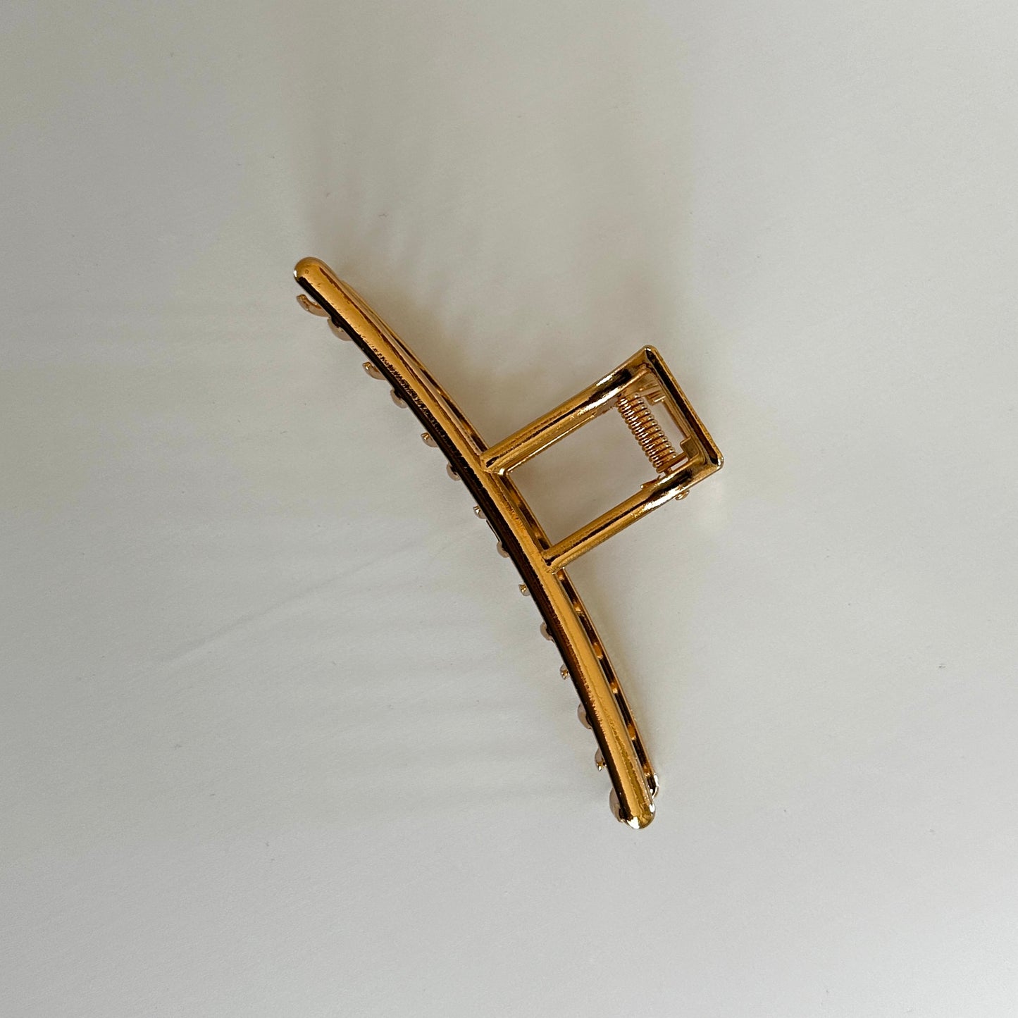 Close up product image of the Minimal Gold-Tone Metal Hair Claw Clip