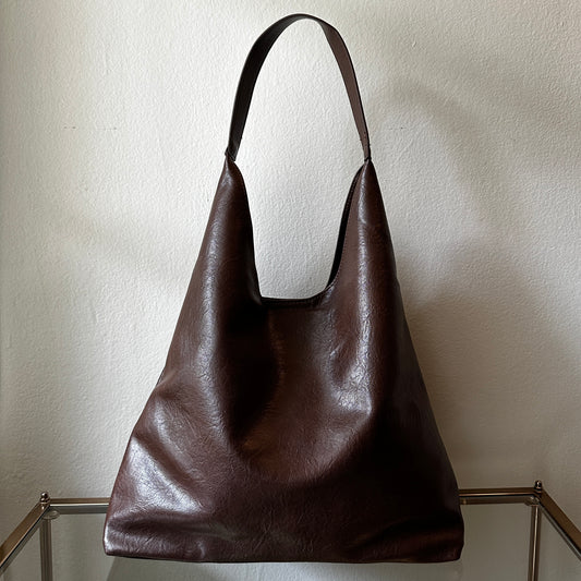 The Brown Vegan Leather Shoulder Handbag shown at the front angle
