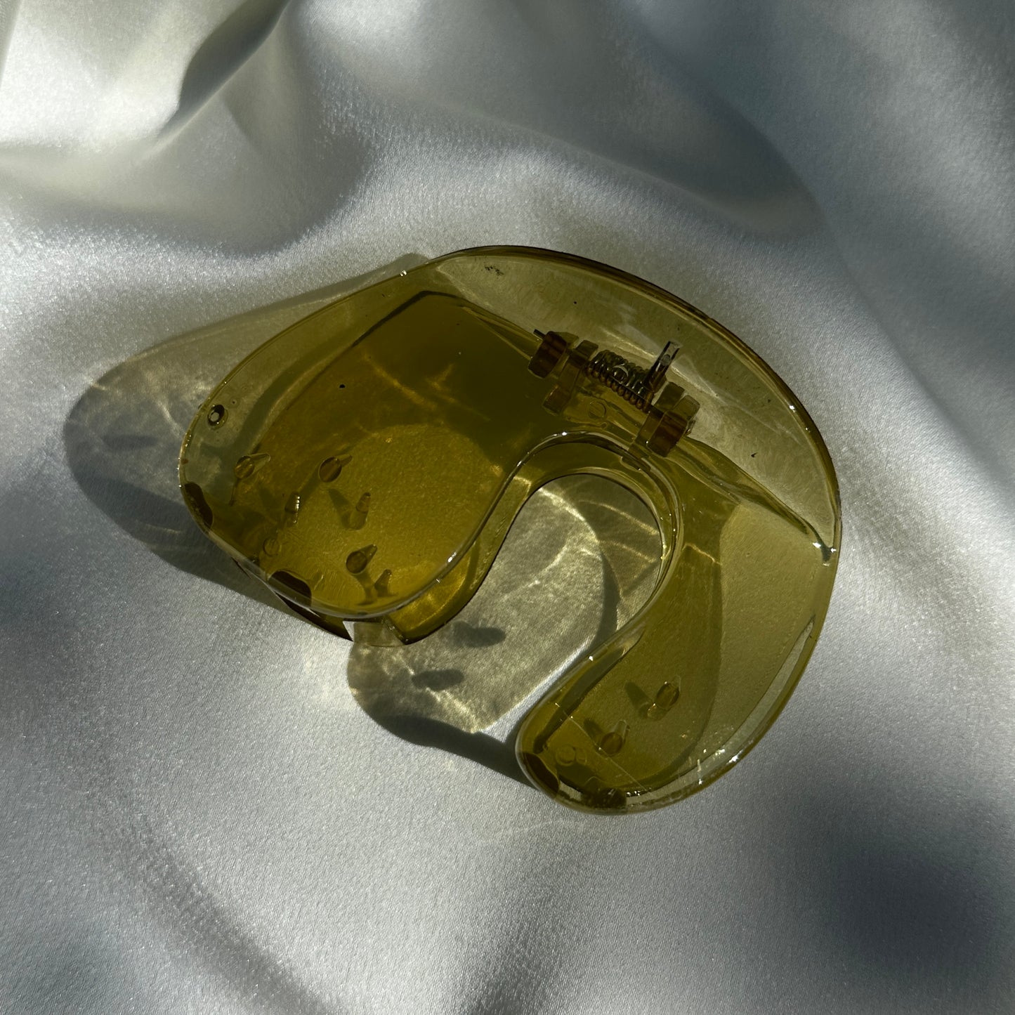 Close up product image of the Jelly U-Shaped Hair Clip in the Olive color