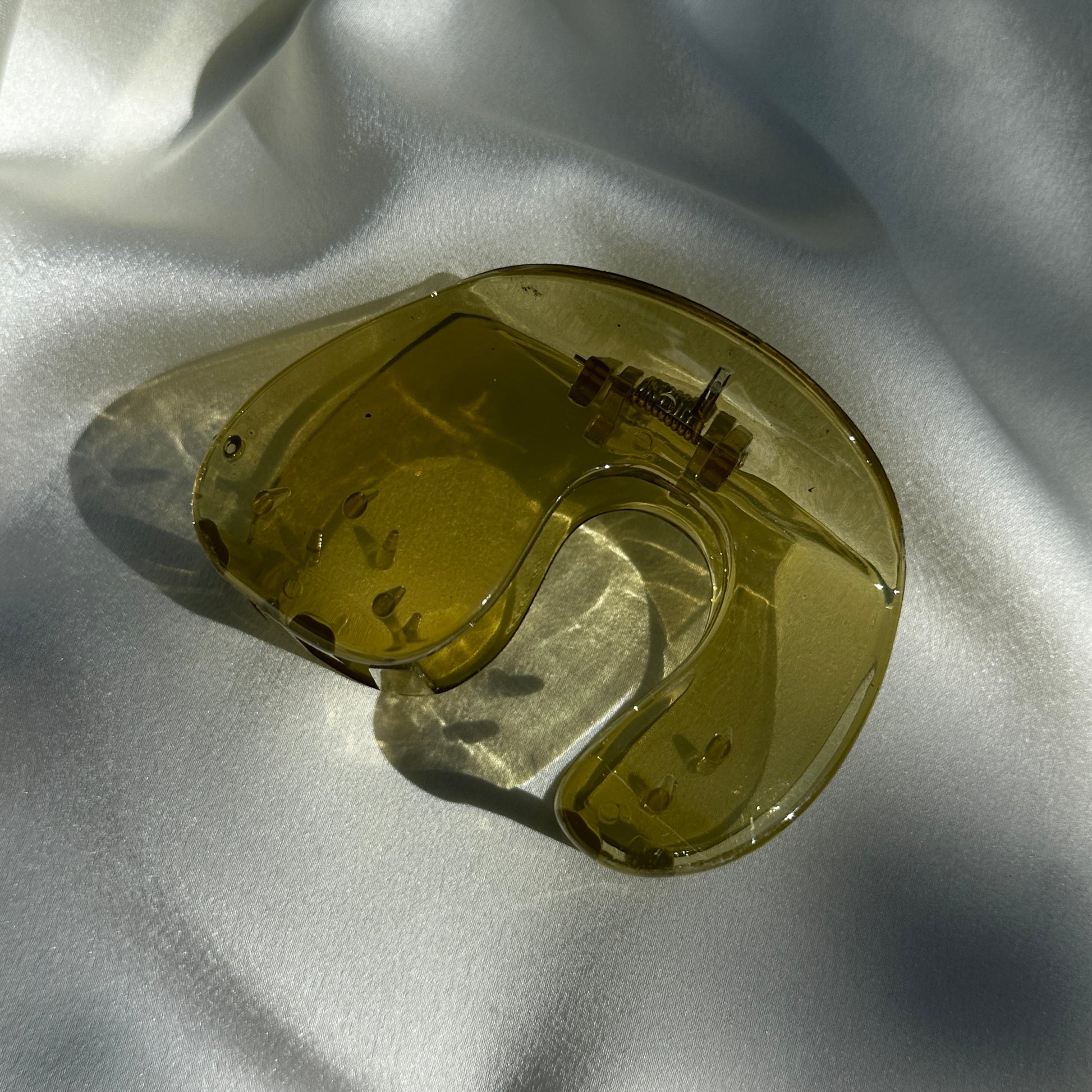 Close up product image of the Jelly U-Shaped Hair Clip in the Olive color